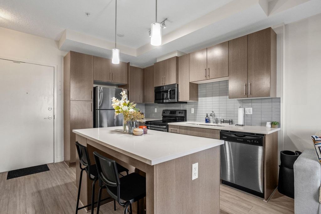 Photo of 15233 1 Street SE #201, Calgary, AB T2X 0X1 (MLS # A2283288)