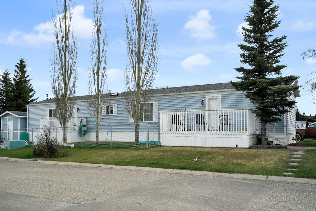 Photo of 118 Heritage Drive, Okotoks, AB T1S 1M4 (MLS # A2310977)