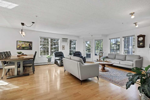 Photo of 6868 Sierra Morena Boulevard SW #227, Calgary, AB T3H 3R6 (MLS # A2347784)