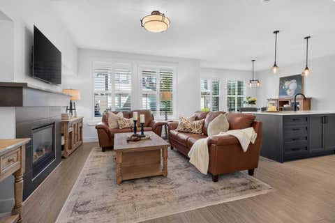 Photo of 110 Coopers Common SW #202, Airdrie, AB T4B 3Y3 (MLS # A2339148)