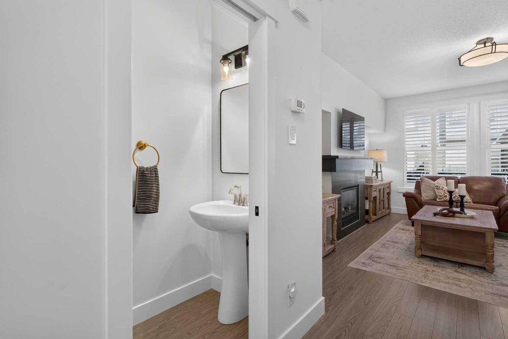 Photo of 110 Coopers Common SW #202, Airdrie, AB T4B 3Y3 (MLS # A2339148)