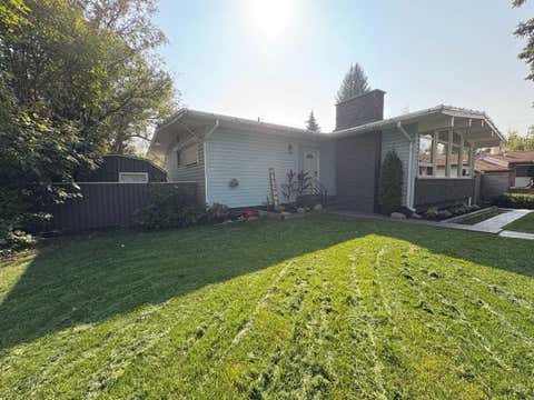 Photo of 8043 Elbow Drive SW, Calgary, AB T2V 1K5 (MLS # A2291798)