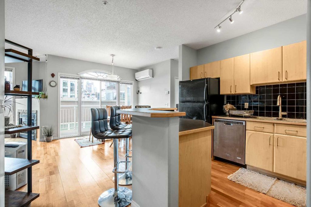 Photo of 1026 12 Avenue SW #306, Calgary, AB T2R 0J6 (MLS # A2273478)