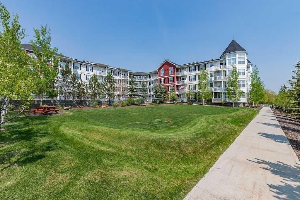 Photo of 1 Crystal Green Lane #137, Okotoks, AB T1S 0C5 (MLS # A2303248)