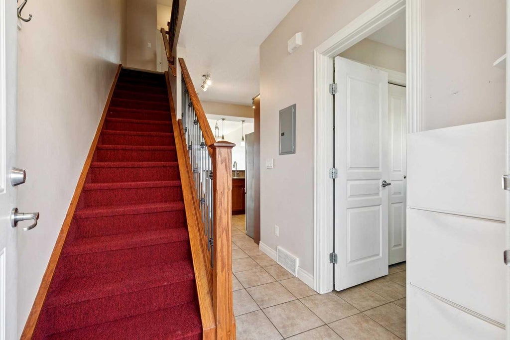 Photo of 169 Rockyledge View NW #14, Calgary, AB T4C 1B1 (MLS # A2339464)