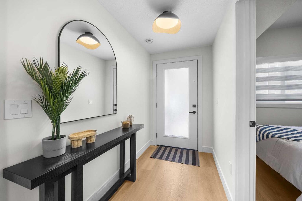 Photo of 67 Panatella Square NW #305, Calgary, AB T3K 2S7 (MLS # A2341888)