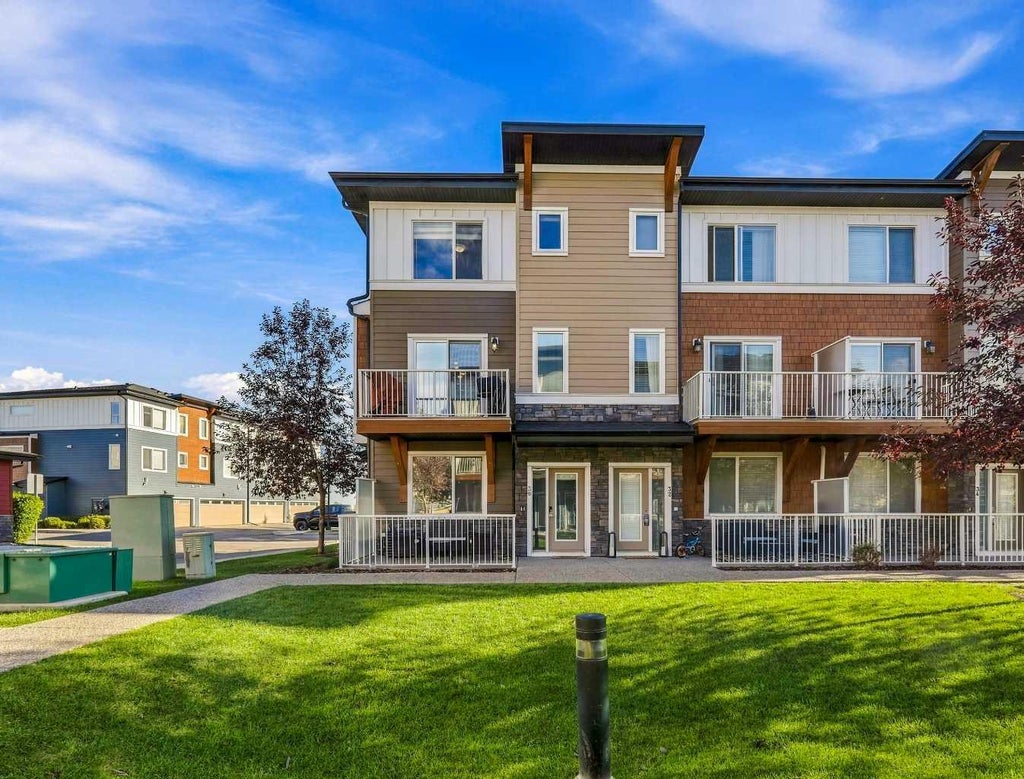 Photo of 111 Rainbow Falls Gate #30, Chestermere, AB T1X 0Z5 (MLS # A2349230)