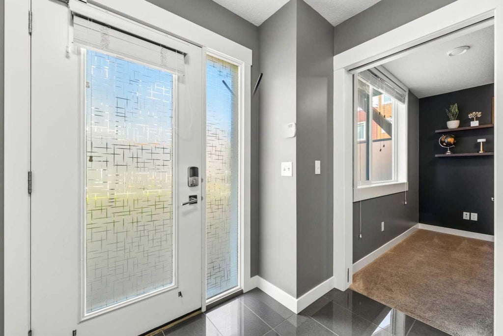 Photo of 111 Rainbow Falls Gate #30, Chestermere, AB T1X 0Z5 (MLS # A2349230)