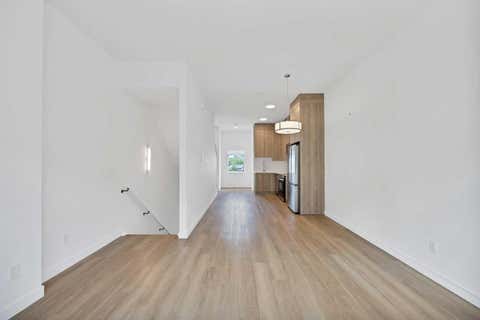 Photo of 101 Panatella Square NW #209, Calgary, AB T3K 2R9 (MLS # A2337860)