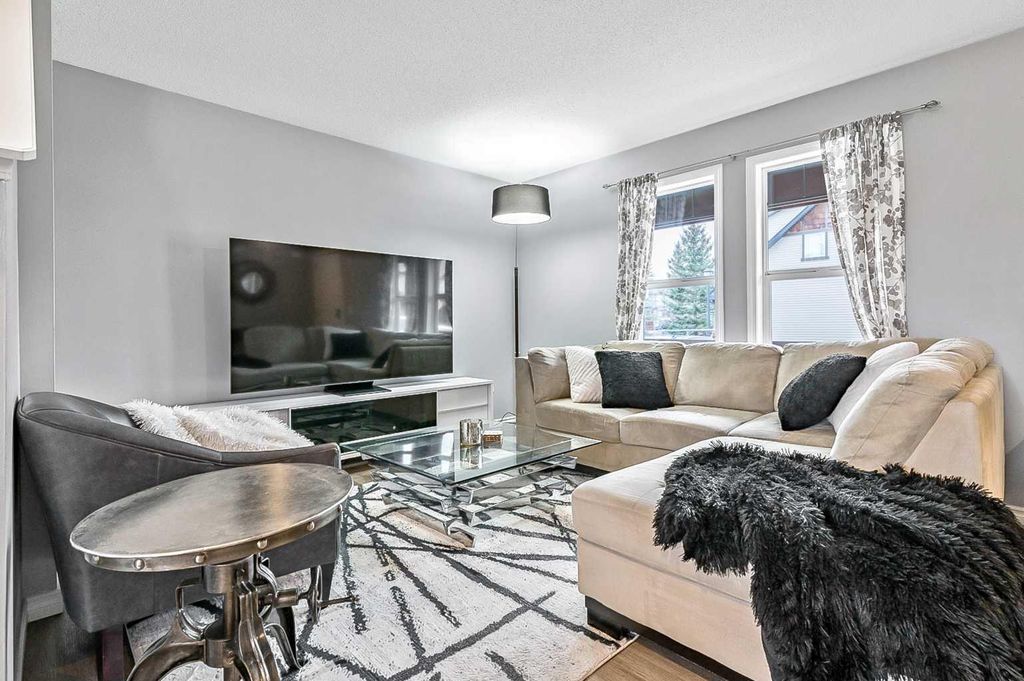 Photo of 106 Panatella Park NW, Calgary, AB T3K 6K4 (MLS # A2296393)