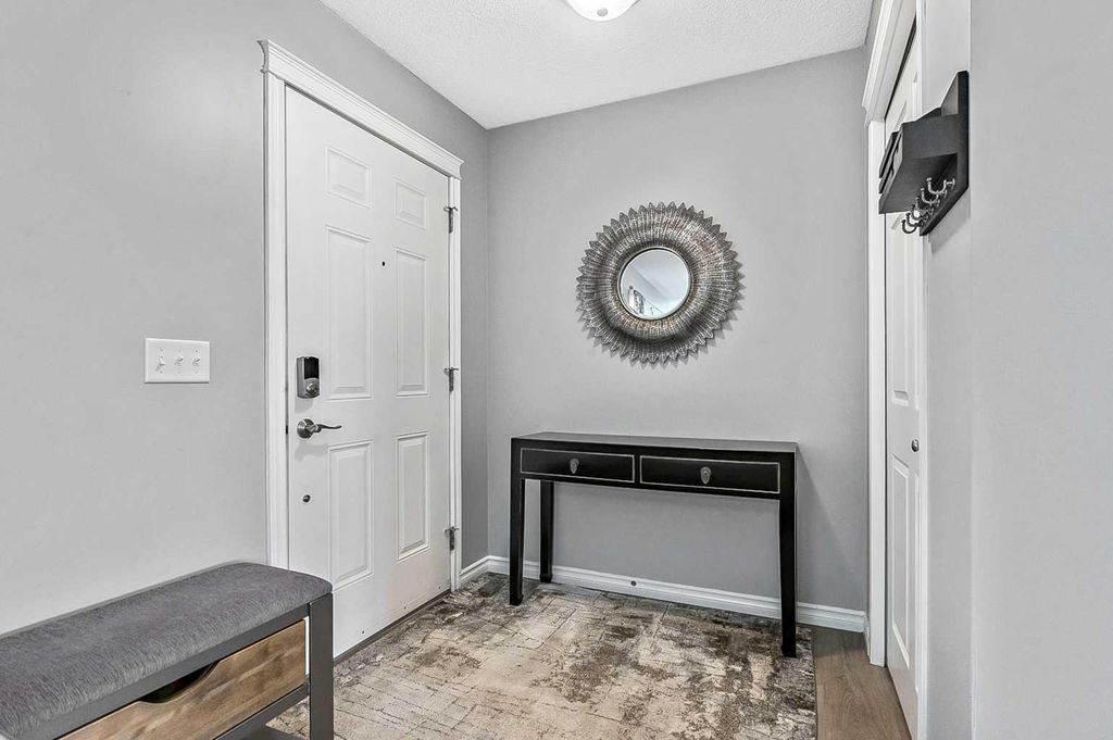 Photo of 106 Panatella Park NW, Calgary, AB T3K 6K4 (MLS # A2296393)