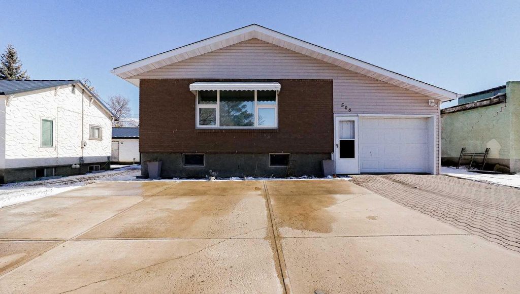 Photo of 506 2 Street W, Bow Island, AB T0K 0G0 (MLS # A2291087)