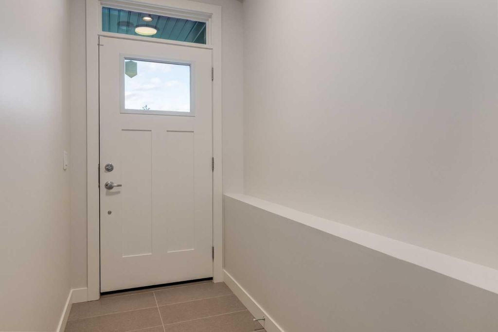 Photo of 819 Shawnee Terrace SW, Calgary, AB T2Y 0T4 (MLS # A2279331)