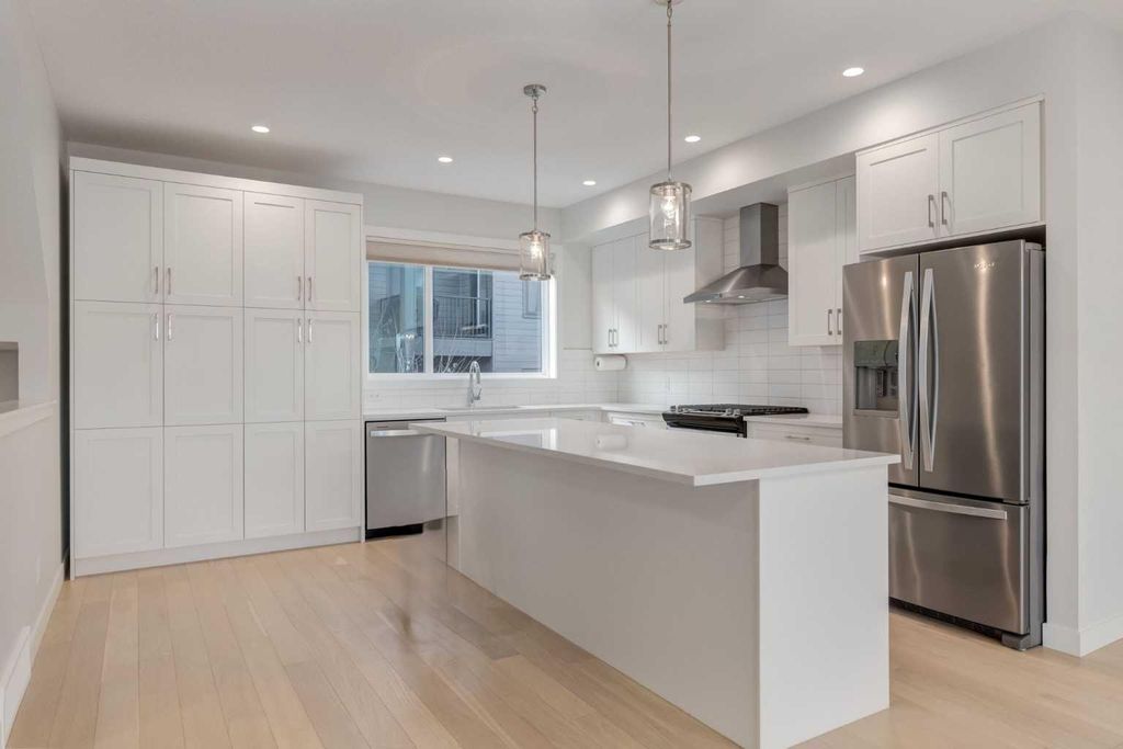 Photo of 819 Shawnee Terrace SW, Calgary, AB T2Y 0T4 (MLS # A2279331)