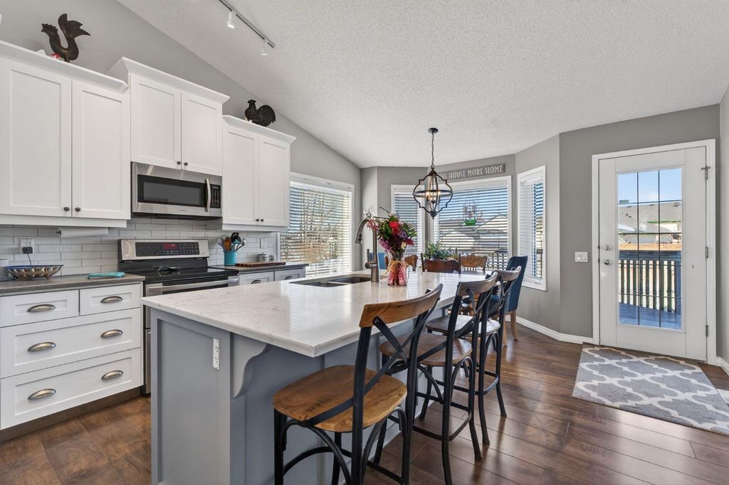 Photo of 306 West Terrace Place, Cochrane, AB T4C 1S3 (MLS # A2291105)