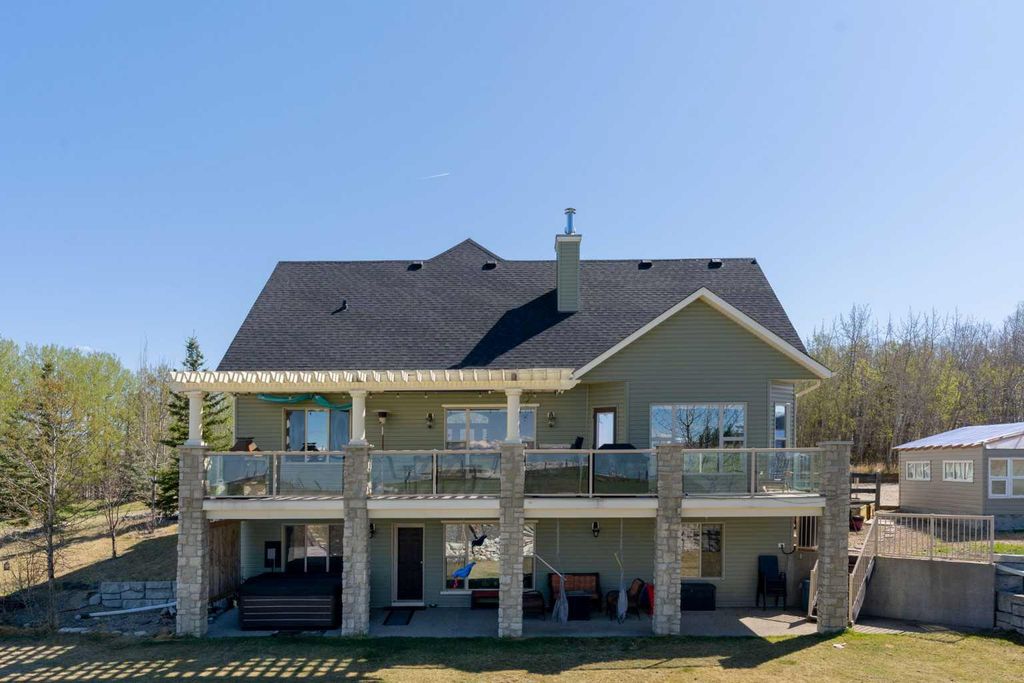 Photo of 281238 Range Road 42, Rural Rocky View County, AB T4C 3A5 (MLS # A2291391)