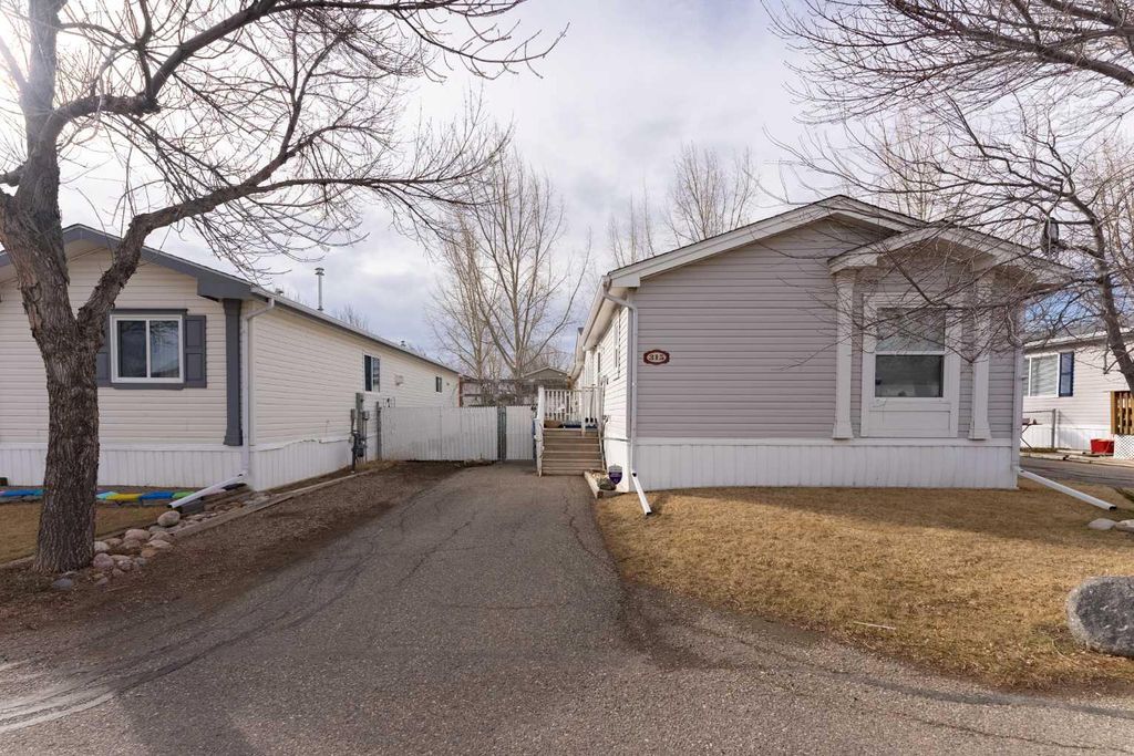 Photo of 315 Yardmaster Avenue, Coaldale, AB T1M 1P6 (MLS # A2292986)