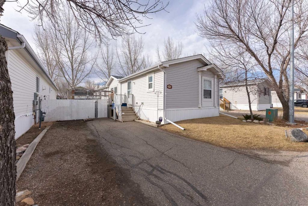 Photo of 315 Yardmaster Avenue, Coaldale, AB T1M 1P6 (MLS # A2292986)
