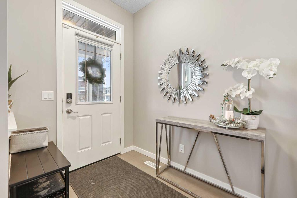 Photo of 754 Belmont Drive SW, Calgary, AB T2X 4H4 (MLS # A2275855)