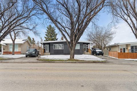 Photo of 710 / 712 72 Avenue NW, Calgary, AB T2K 0P4 (MLS # A2305351)