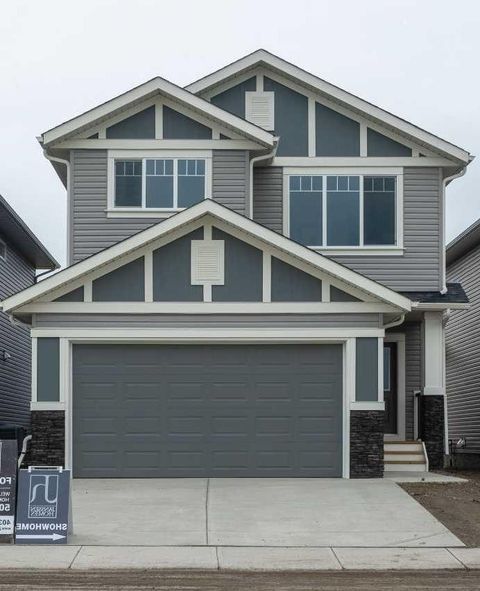 Photo of 546 Rivercrest View, Cochrane, AB T4C 2W9 (MLS # A2328807)