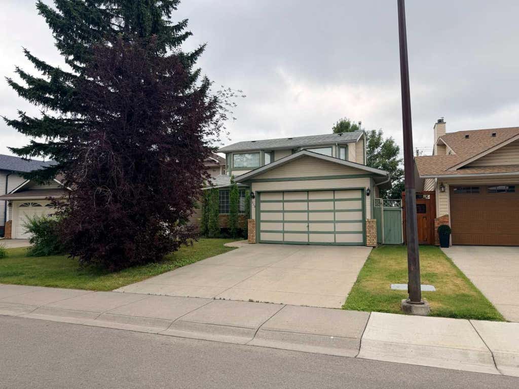 Photo of 319 Sunvale Drive SE, Calgary, AB T2X 3B8 (MLS # A2337003)