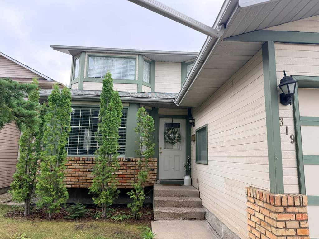 Photo of 319 Sunvale Drive SE, Calgary, AB T2X 3B8 (MLS # A2337003)