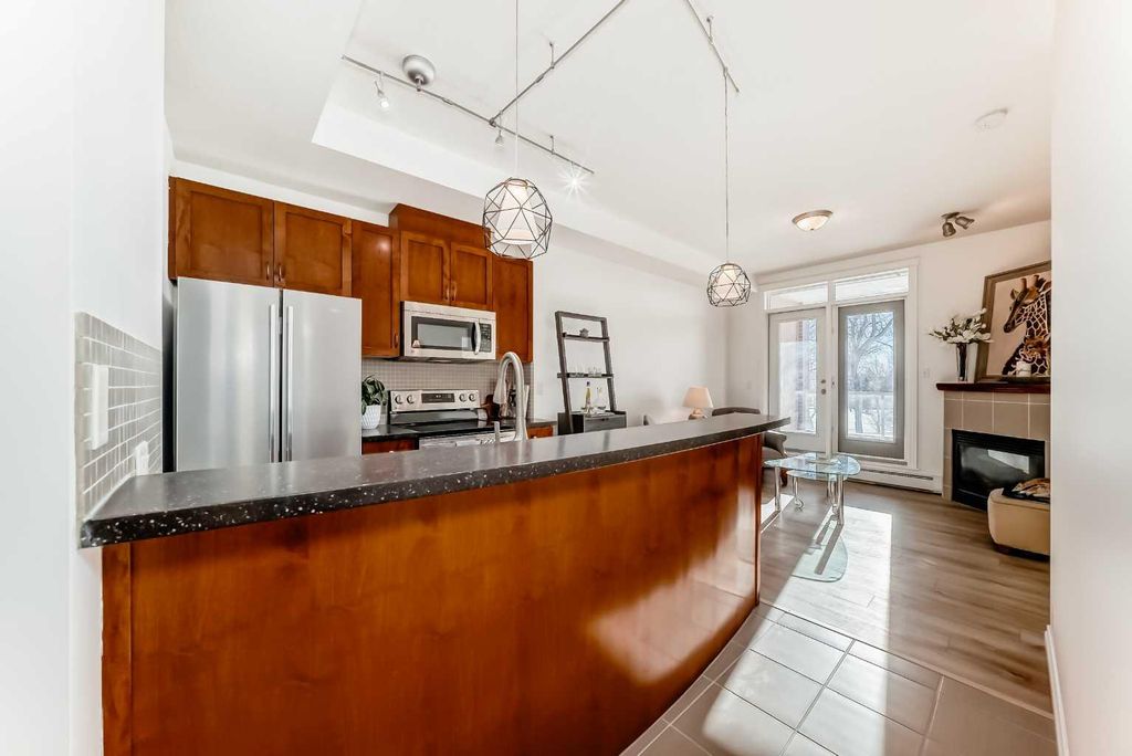 Photo of 24 Hemlock Crescent SW #3217, Calgary, AB T3C 2Z1 (MLS # A2280355)