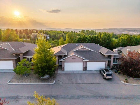 Photo of 61 River Heights View, Cochrane, AB T4C 0E6 (MLS # A2332100)