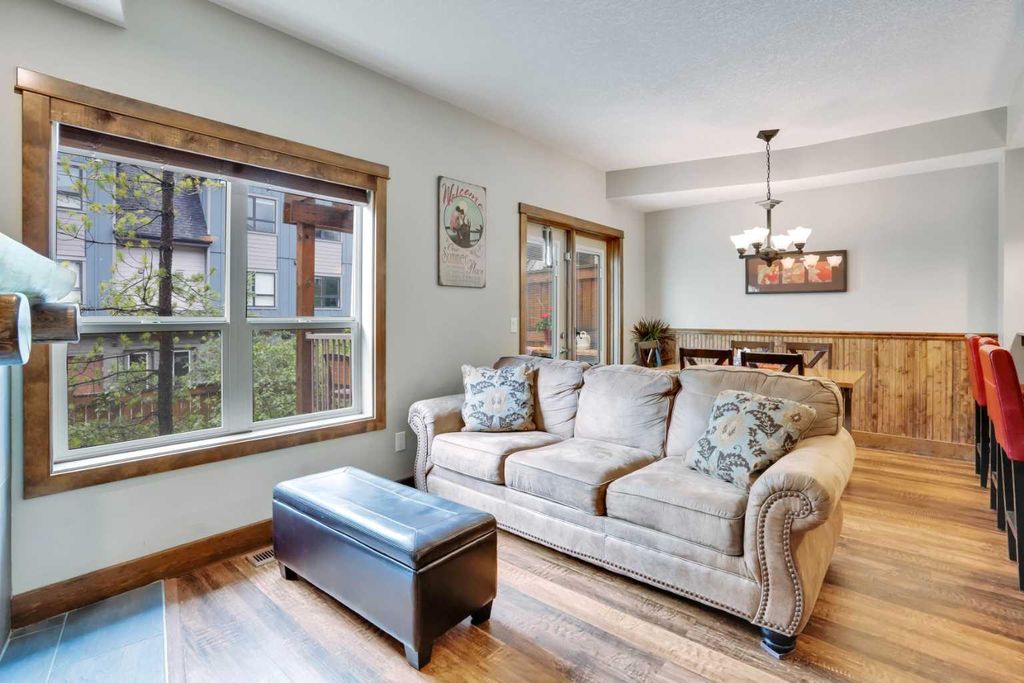 Photo of 121 Kananaskis Way Way #102, Canmore, AB T1W 2X2 (MLS # A2286564)