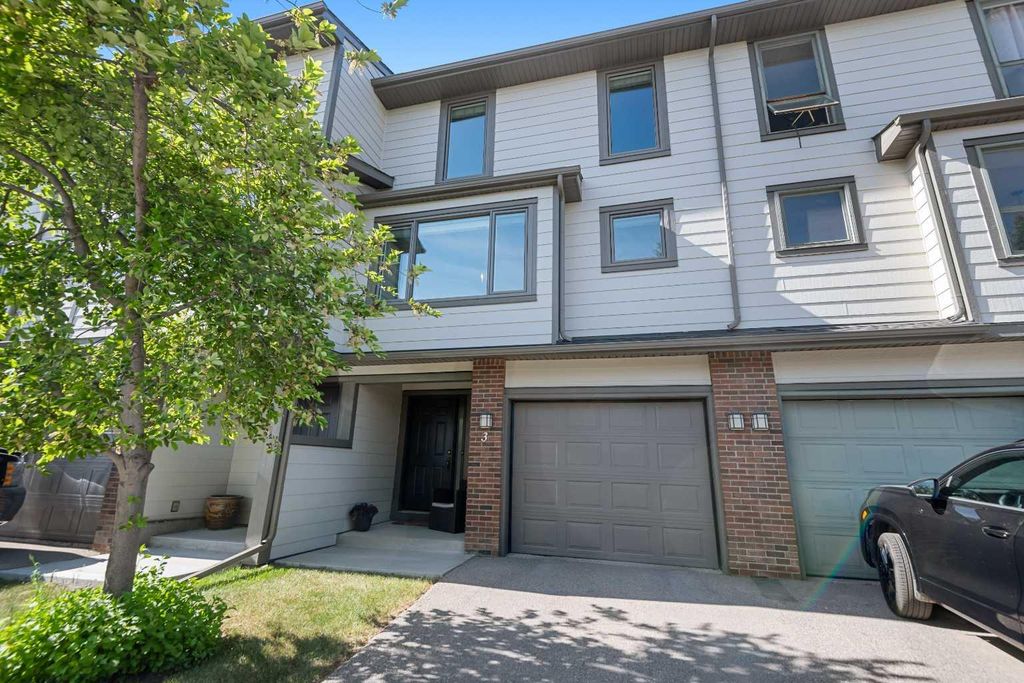 Photo of 185 Woodridge Drive SW #3, Calgary, AB T2W 3X7 (MLS # A2316597)