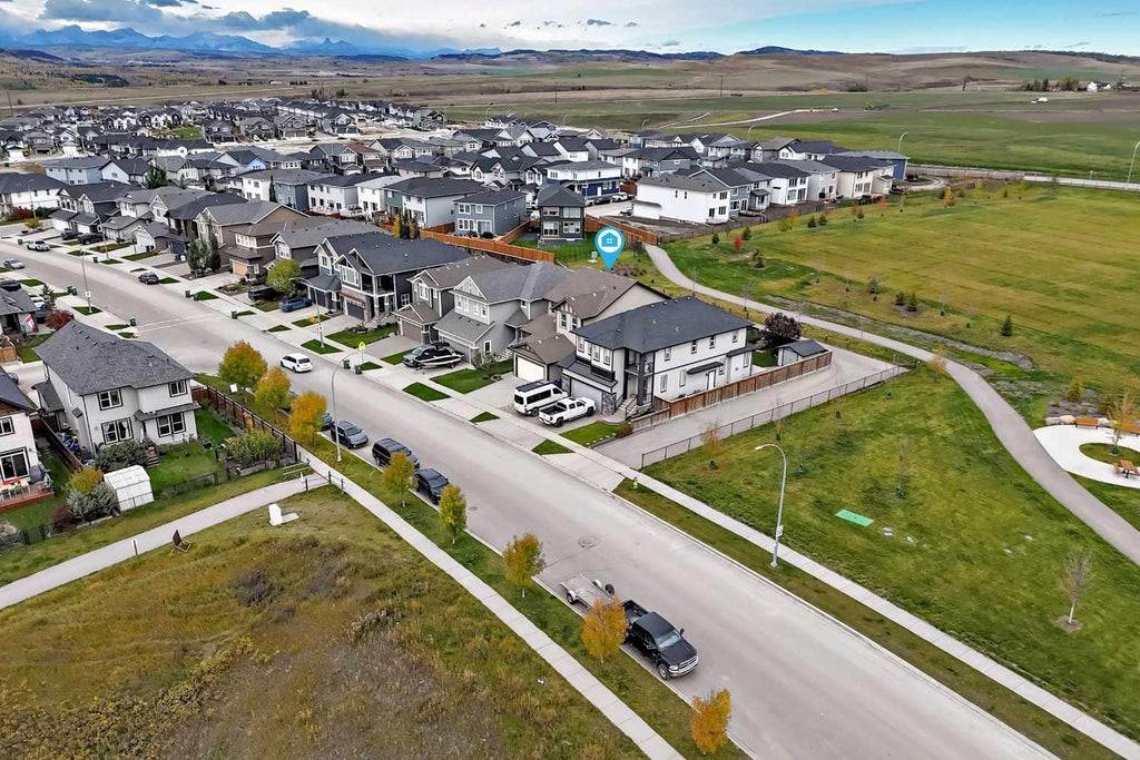 Photo of 213 Heritage Boulevard, Cochrane, AB T4C 0S6 (MLS # A2345028)