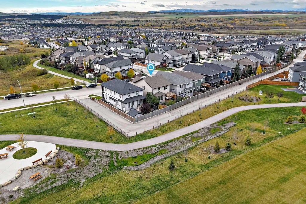 Photo of 213 Heritage Boulevard, Cochrane, AB T4C 0S6 (MLS # A2345028)