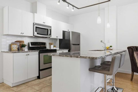 Photo of 328 21 Avenue SW #210, Calgary, AB T2S 0G8 (MLS # A2345052)