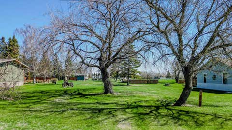 Photo of 235 S 100 E, Raymond, AB T0K 2S0 (MLS # A2340241)