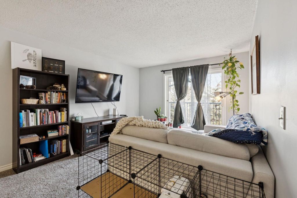 Photo of 11 Dover Point SE #412, Calgary, AB T2B 3J8 (MLS # A2291691)