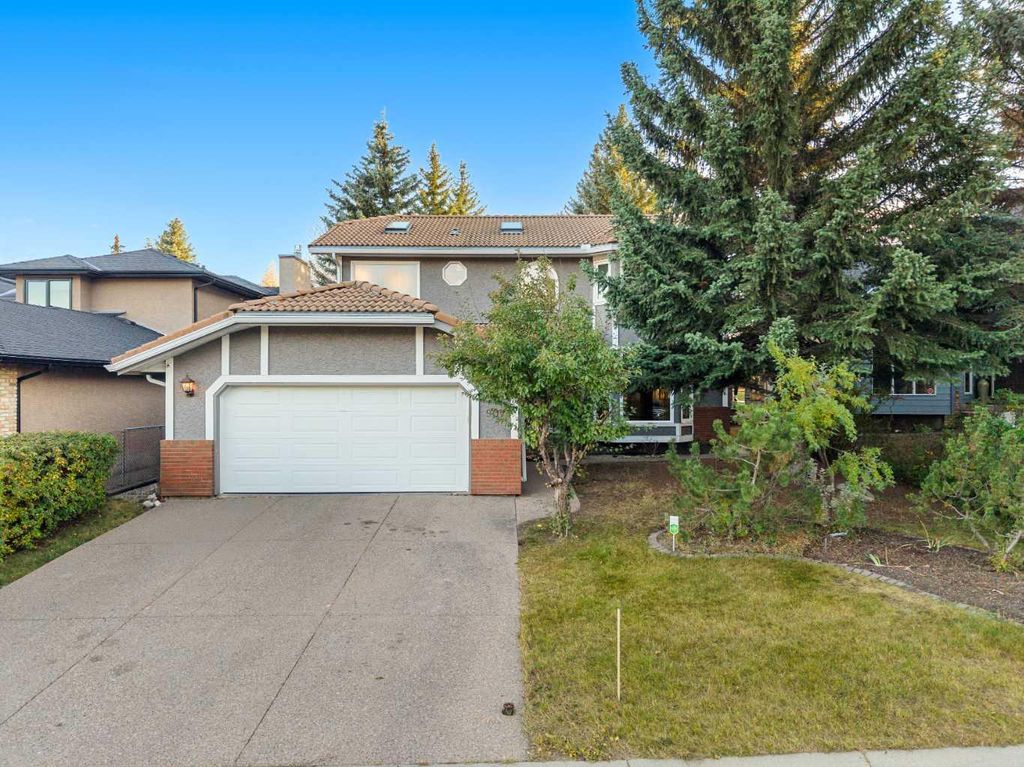 Photo of 907 Shawnee Drive SW, Calgary, AB T2Y 2G8 (MLS # A2263758)