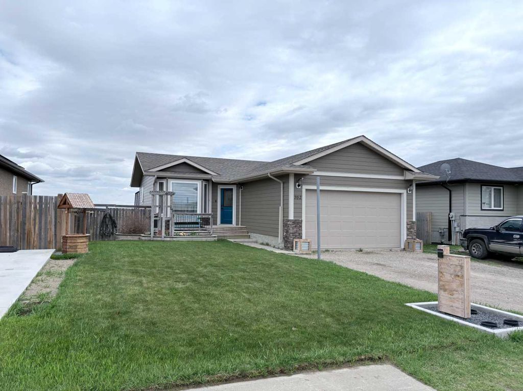 Photo of 702 2 Street E, Cardston, AB T0K 0K0 (MLS # A2307849)