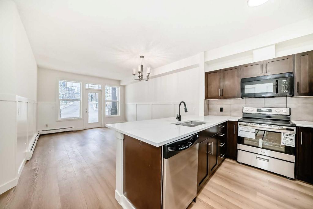 Photo of 22 Panatella Road NW #101, Calgary, AB T3K 0V4 (MLS # A2290846)
