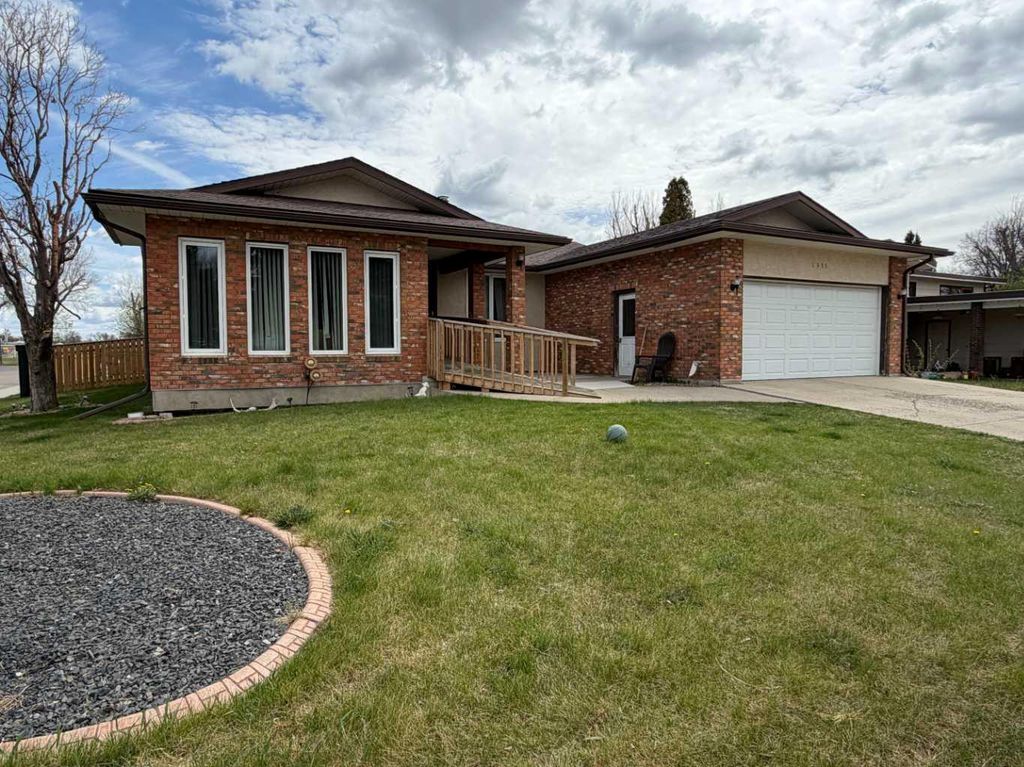 Photo of 5411 46 Street, Taber, AB T1G 1G7 (MLS # A2306986)