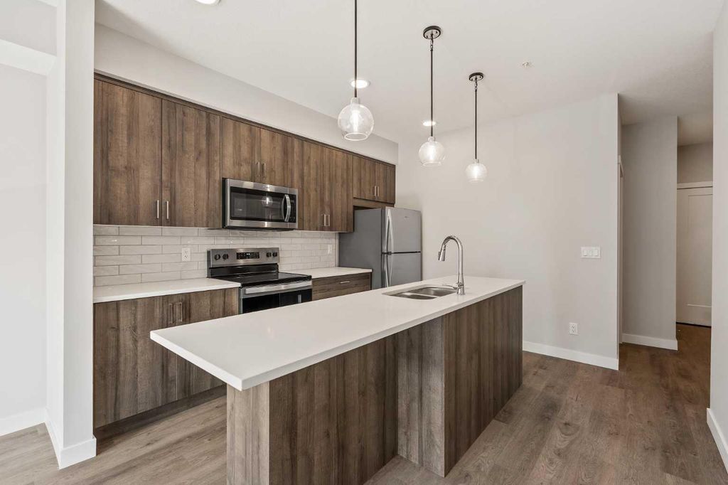 Photo of 660 Shawnee Square SW #213, Calgary, AB T2Y 0X6 (MLS # A2264270)