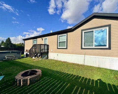 Photo of 1501 15 Street Crescent, Wainwright, AB T9W 1K8 (MLS # A2344097)