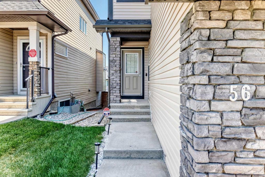 Photo of 56 PANATELLA Parade NW, Calgary, AB T3K 0V6 (MLS # A2323033)
