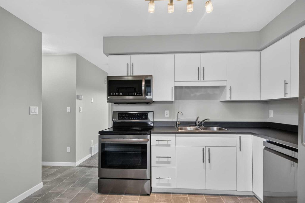 Photo of 711 Beacon Hill Dr #25, Fort McMurray, AB T9H 3R5 (MLS # A2335956)