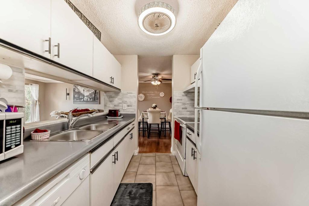 Photo of 20 Dover Point SE #314, Calgary, AB T2B 3K3 (MLS # A2305691)