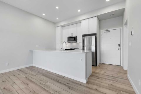 Photo of 255 Les Jardins Park SE #408, Calgary, AB T2C 5W9 (MLS # A2273854)