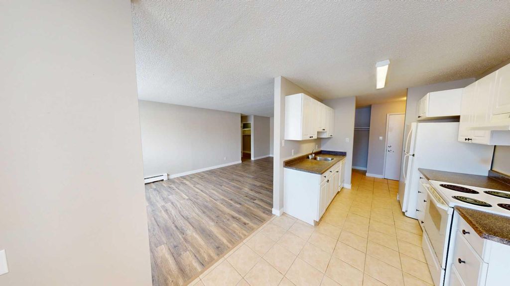 Photo of 10105 107 Avenue #102, Grande Prairie, AB T8V 1M1 (MLS # A2292353)