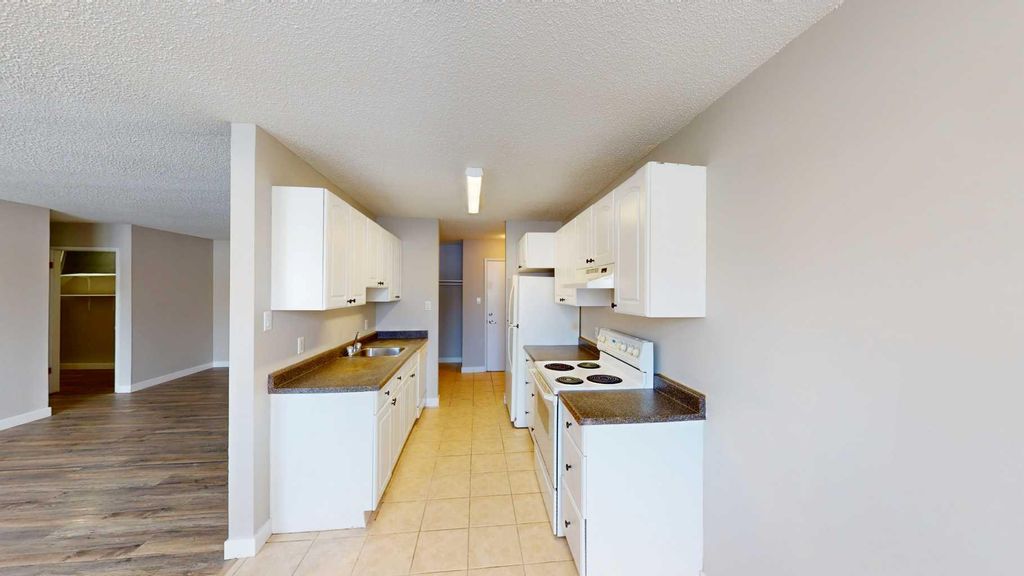 Photo of 10105 107 Avenue #102, Grande Prairie, AB T8V 1M1 (MLS # A2292353)