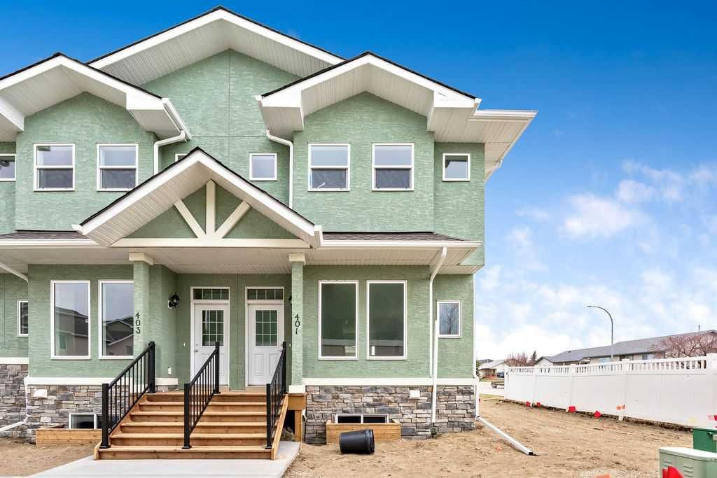 Photo of 401 Strathcona Circle, Strathmore, AB T1P 0B1 (MLS # A2304200)