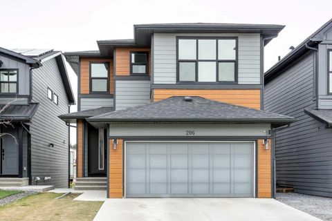 Photo of 206 Rowley Way NW, Calgary, AB T3L 0G7 (MLS # A2304849)